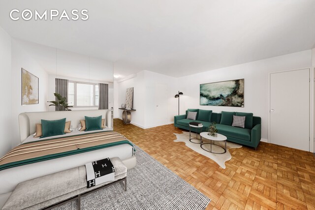 bedroom featuring parquet flooring