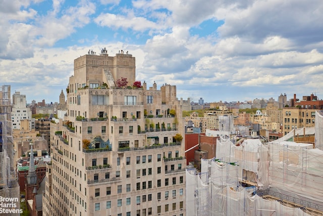 view of property with a city view