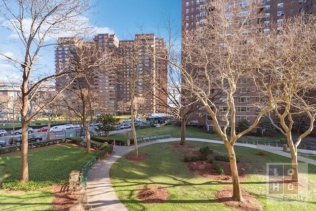 surrounding community featuring a lawn