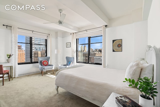 200 W 86th St Unit 17C, New York City, NY 10024 - bedroom with multiple windows, a city view, and carpet flooring