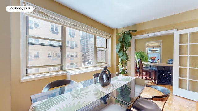 dining space featuring plenty of natural light