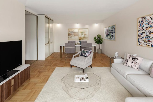 living room with light parquet floors