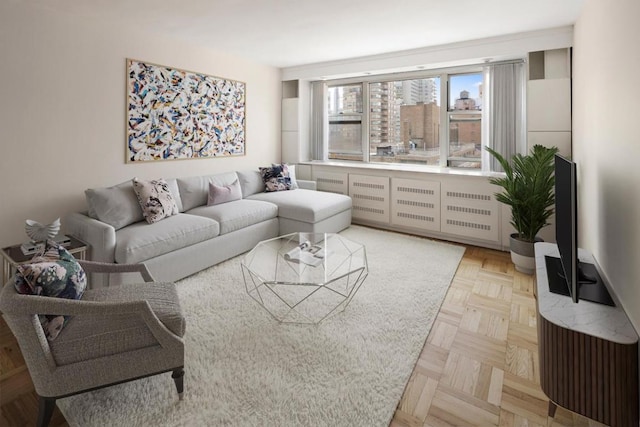 living room with parquet flooring