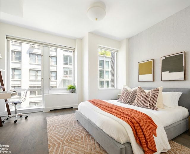 bedroom featuring wood-type flooring