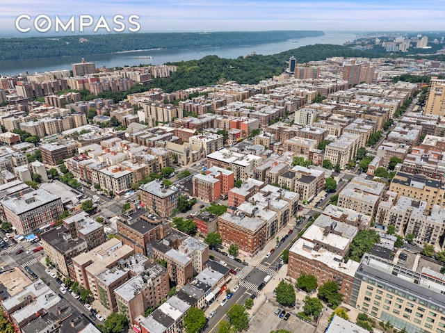 aerial view featuring a view of city and a water view