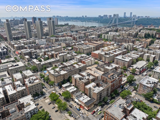 aerial view featuring a city view and a water view