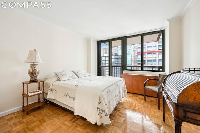 bedroom with parquet flooring and ornamental molding