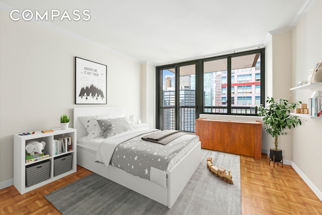 bedroom featuring crown molding, baseboards, and access to outside