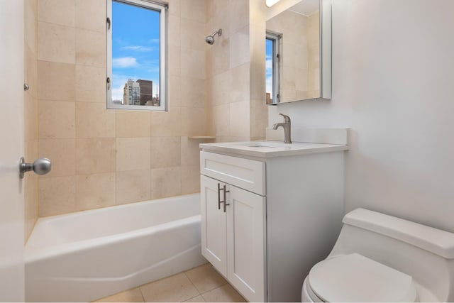 bathroom featuring toilet, shower / bath combination, tile patterned flooring, and vanity