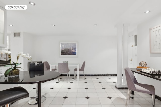 dining room featuring light tile patterned floors