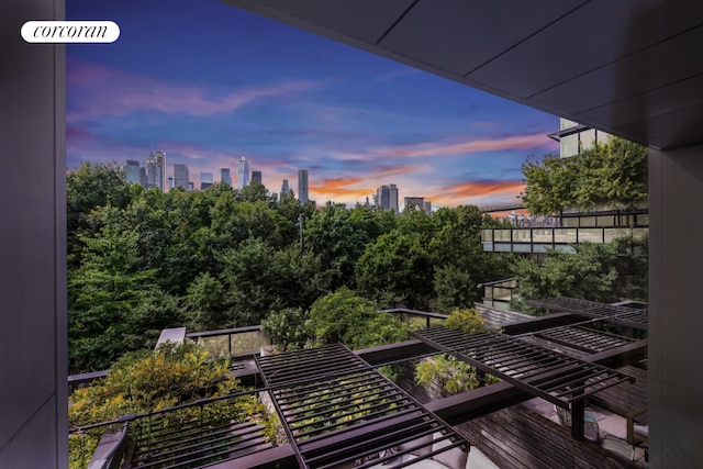 view of balcony at dusk