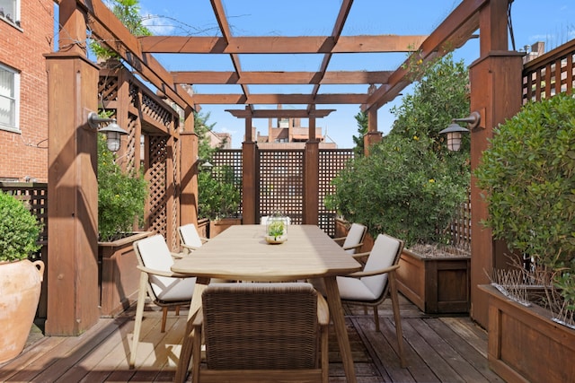 wooden deck featuring a pergola