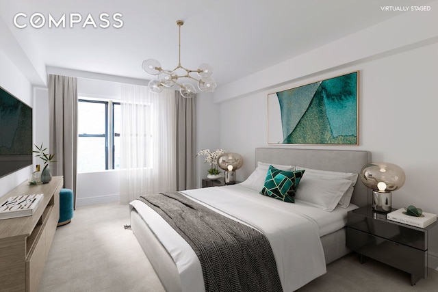 bedroom featuring a chandelier and light colored carpet