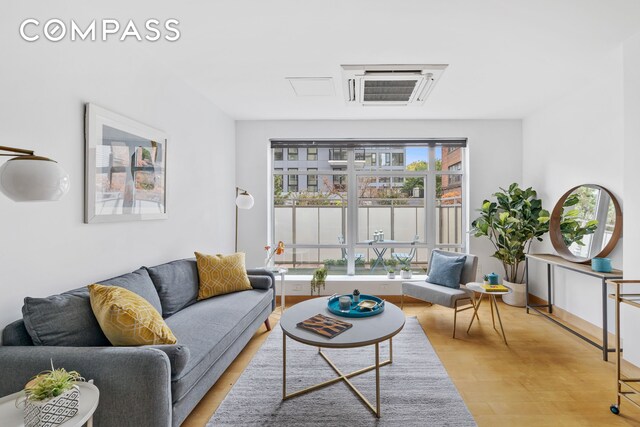 living room featuring light hardwood / wood-style floors