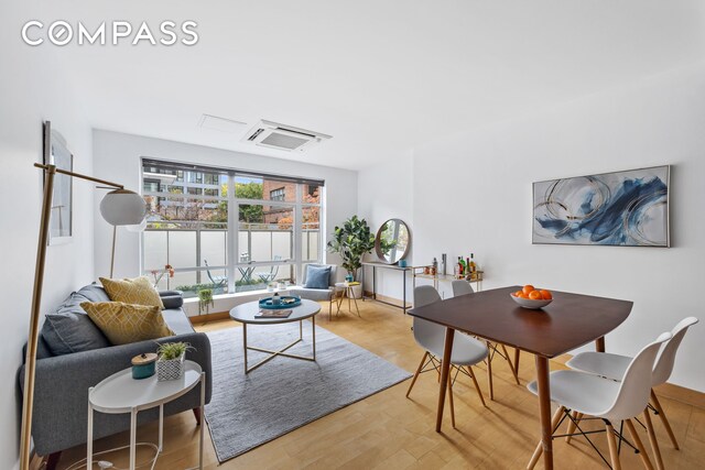 living room with hardwood / wood-style floors