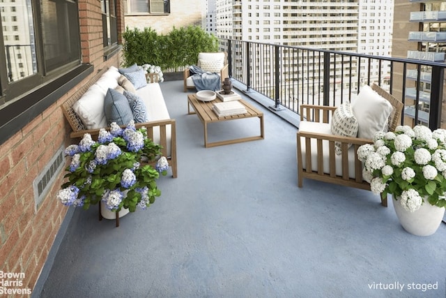 balcony with an outdoor hangout area