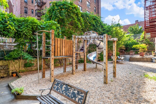 view of play area featuring fence