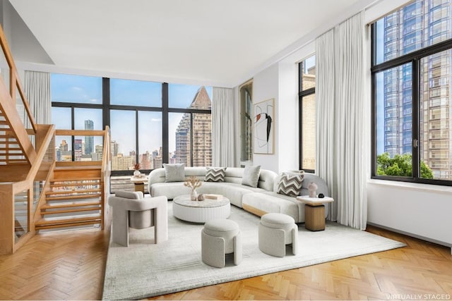 living room featuring light parquet flooring