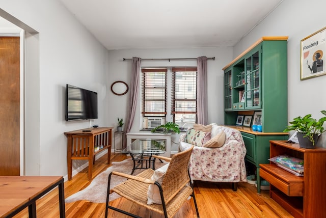 sitting room with light wood-style floors