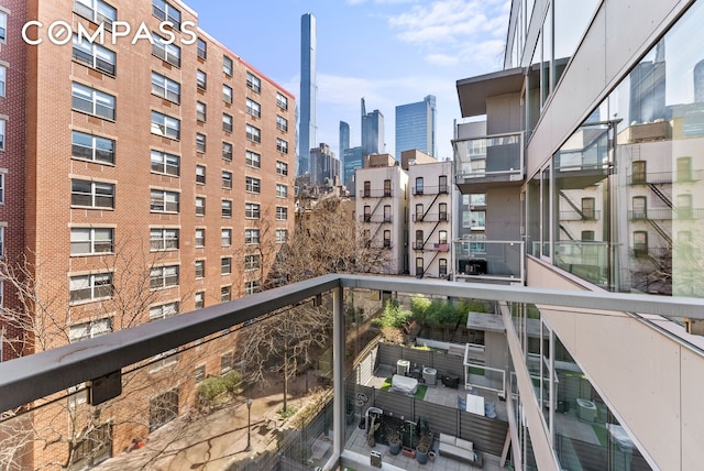 balcony featuring a city view