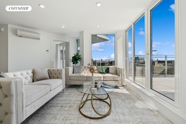 living room with visible vents, recessed lighting, a wall mounted air conditioner, and expansive windows