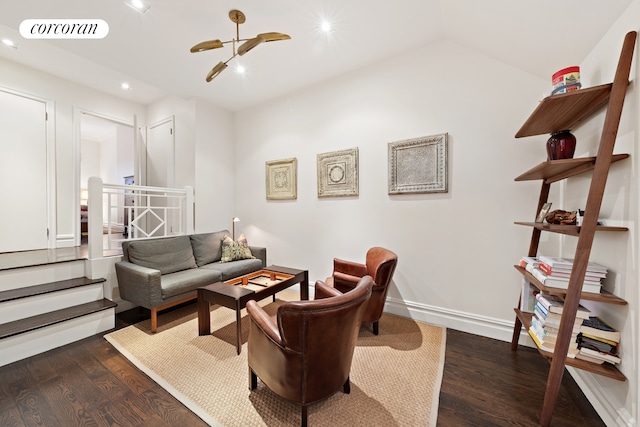 living area with dark wood-style flooring, recessed lighting, lofted ceiling, visible vents, and baseboards