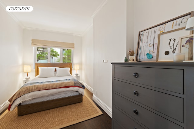 bedroom with baseboards, dark wood-type flooring, visible vents, and crown molding