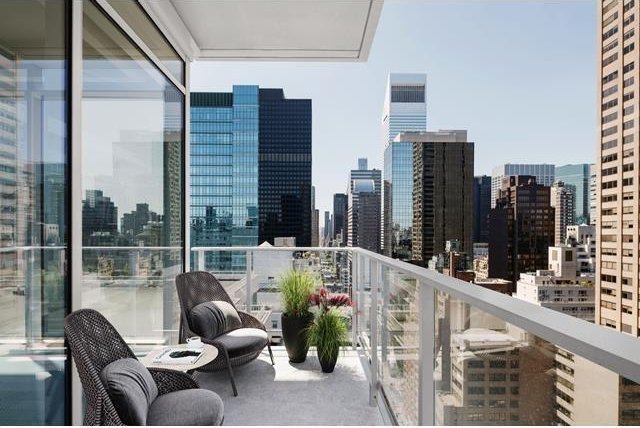 balcony featuring a city view