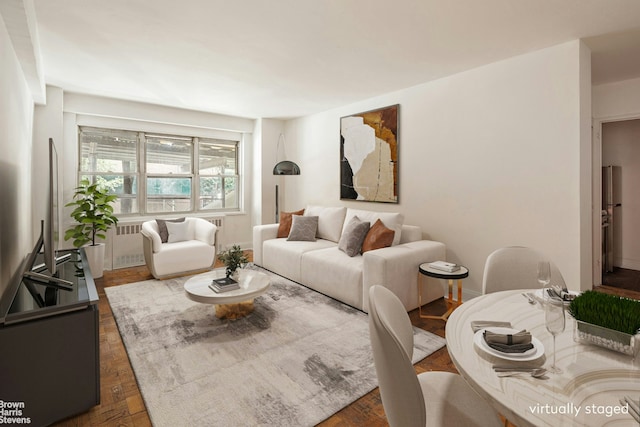 living room with wood finished floors