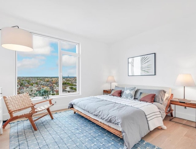 bedroom featuring light wood-type flooring