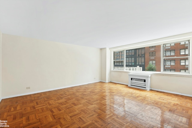 139 E 33rd St Unit 2C, New York City, NY 10016 - unfurnished room with baseboards and heating unit