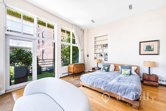 bedroom featuring hardwood / wood-style flooring