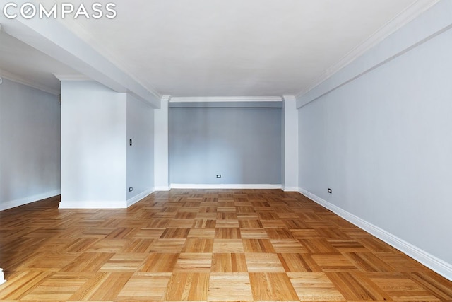 unfurnished room featuring light parquet floors and ornamental molding