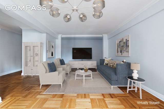 living area featuring crown molding, baseboards, and a chandelier