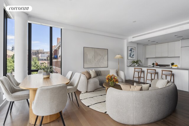 living room featuring hardwood / wood-style flooring and floor to ceiling windows