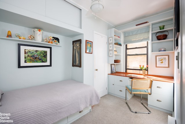 bedroom with light carpet and ceiling fan