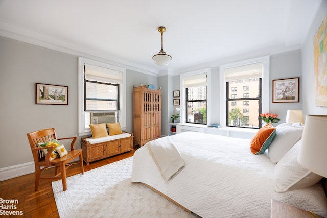 bedroom with multiple windows, crown molding, and dark hardwood / wood-style floors