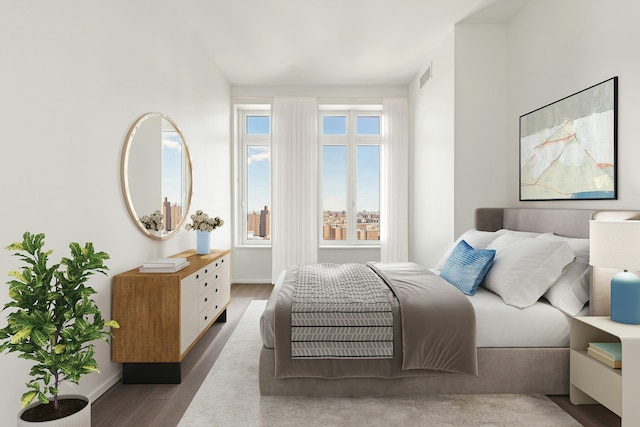 543 W 122nd St Unit 27A, New York City, NY 10027 - bedroom featuring wood finished floors and baseboards