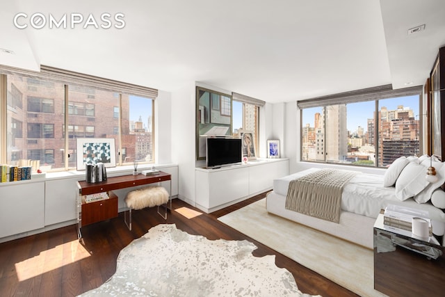 350 E 82nd St Unit 14Ab, New York City, NY 10028 - bedroom with multiple windows and wood finished floors