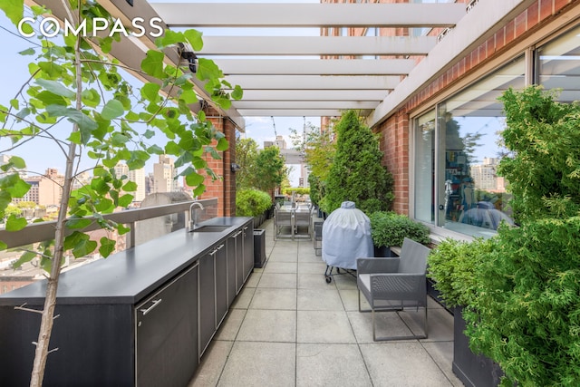 350 E 82nd St Unit 14Ab, New York City, NY 10028 - view of patio featuring a sink and a pergola