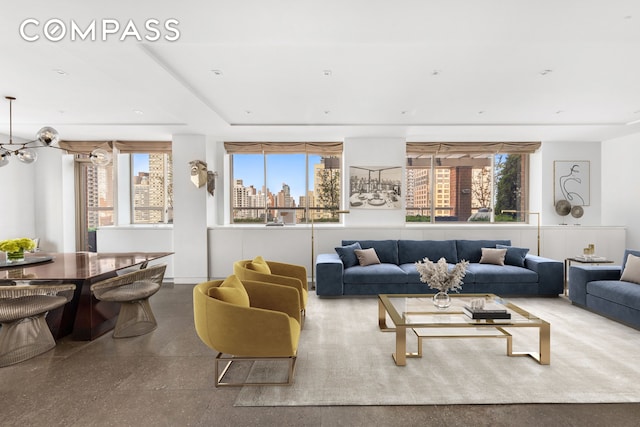 350 E 82nd St Unit 14Ab, New York City, NY 10028 - living room featuring plenty of natural light and a view of skyline
