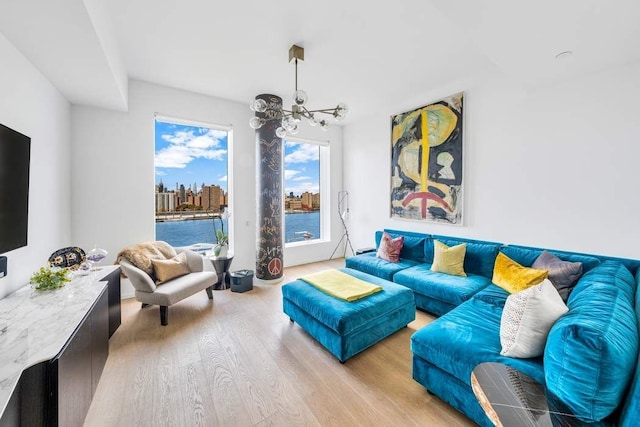1 John St Phe, Phe, New York City, NY 11201 - living area with an inviting chandelier and wood finished floors