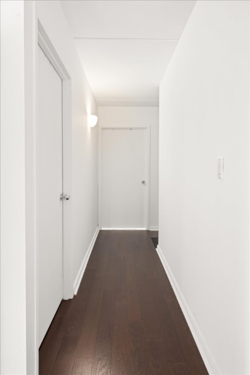 exercise room featuring electric panel and a textured ceiling