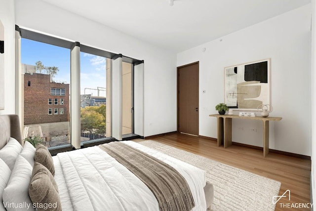 bedroom featuring wood-type flooring