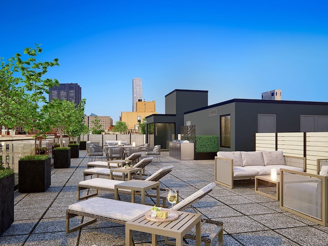 view of patio featuring outdoor dining space, an outdoor living space, and a city view