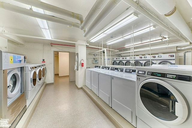 laundry room featuring separate washer and dryer