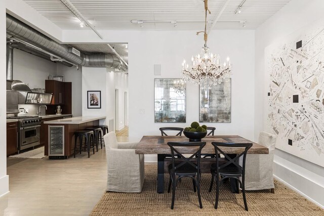 living area with hardwood / wood-style flooring, elevator, and plenty of natural light