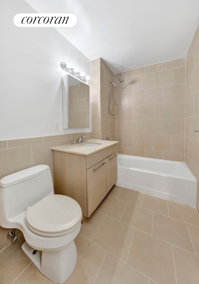 2279 3rd Ave Unit 3C, New York City, NY 10035 - bathroom with tile walls, tile patterned flooring, bathing tub / shower combination, toilet, and vanity