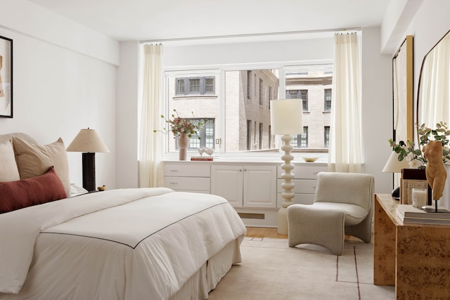 bedroom featuring light wood-type flooring