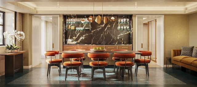 bar with a tray ceiling, sink, and decorative backsplash